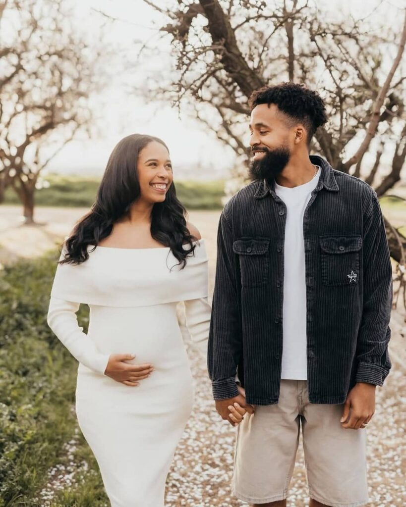 Marcelas Howard with wife
